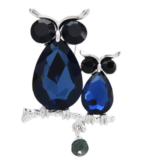 deux hiboux sur une broche